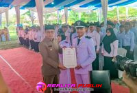 pelantikan  Kepalo Tiyuh Antar  Waktu (PAW) Karta Sari Kecamatan tulang bawang Udik (realitapublik.id, Rody Sandra)