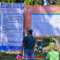 Informasi tahapan dan persyaratan pendaftaran lewat spanduk yang dipasang panitia di depan kantor Desa Selomukti, Kecamatan Mlandingan, Kabupaten Situbondo. (Photo: realitapublik.id) 